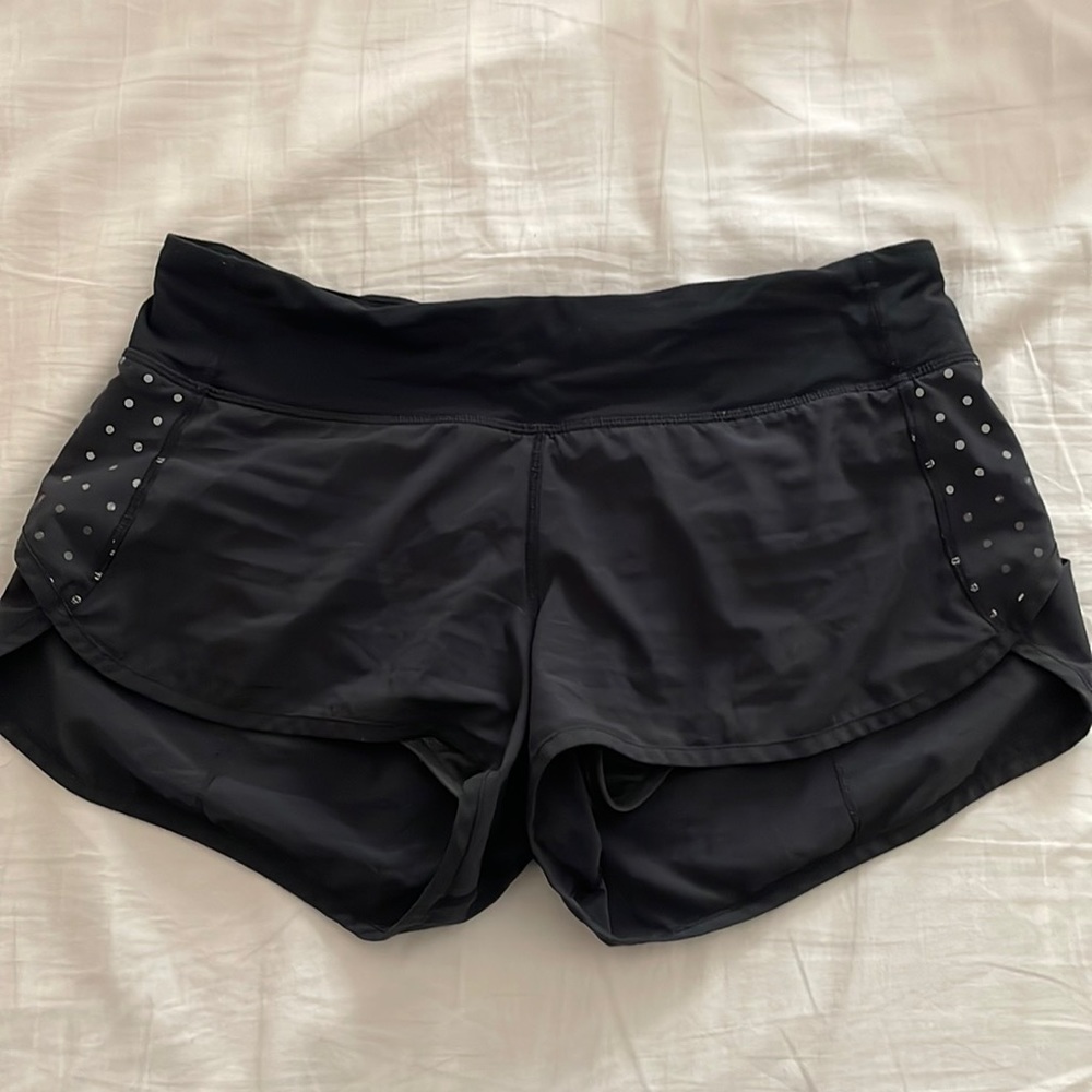 Gently used lululemon speed-up shorts with reflective dots (2.5 inch)